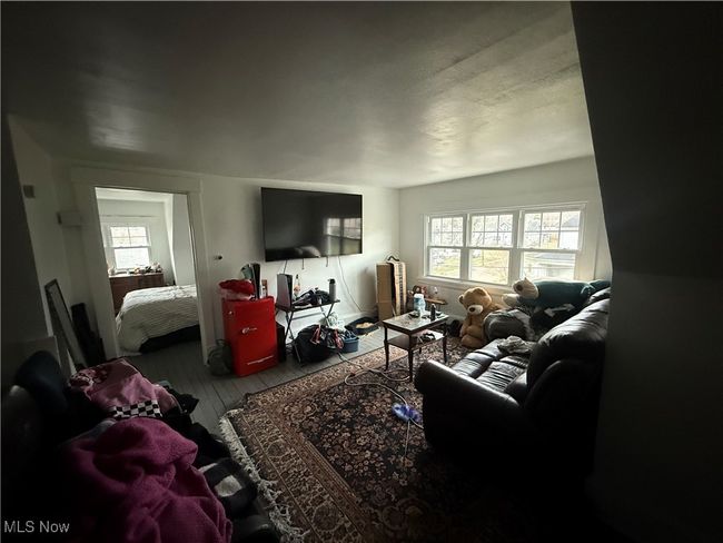 Living room featuring wood finished floors | Image 9