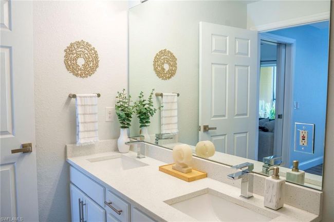 Full bathroom with double vanity and a sink | Image 12