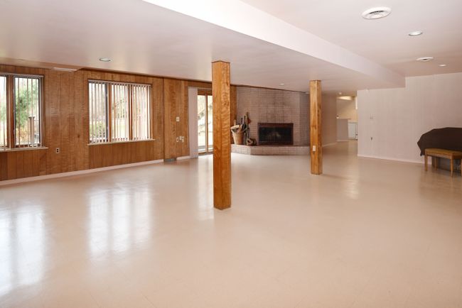 awesome finished lower level with fireplace | Image 32