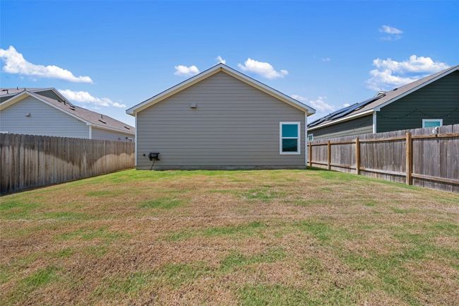 Rear view of property with a fenced backyard | Image 33