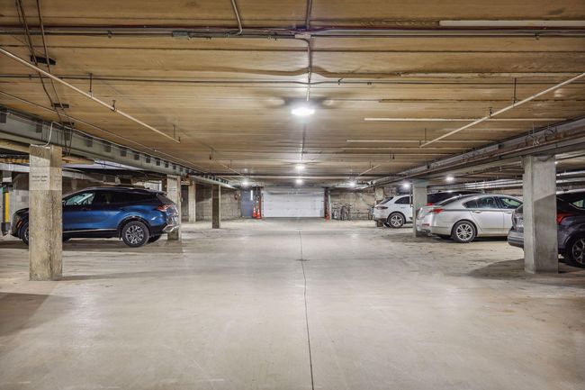 Stay warm year-round with your own underground parking space—plus convenient guest parking, a rare find near the lakes and Uptown. | Image 45