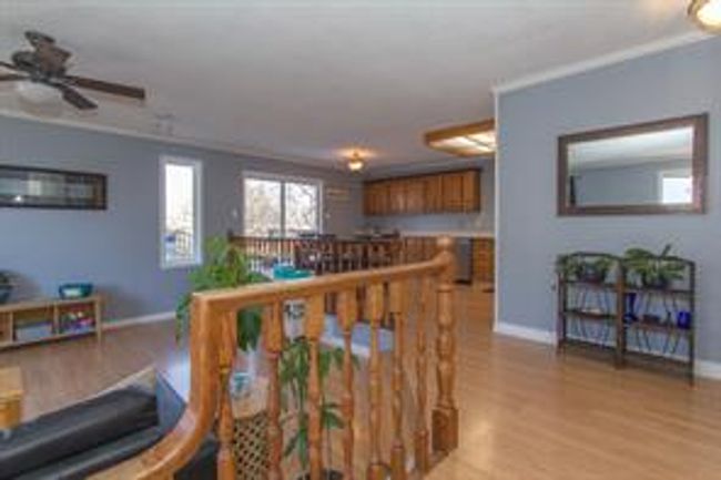 212 Big Springs Crt Se, House detached with 5 bedrooms, 1 bathrooms and 3 parking in Airdrie AB | Image 5