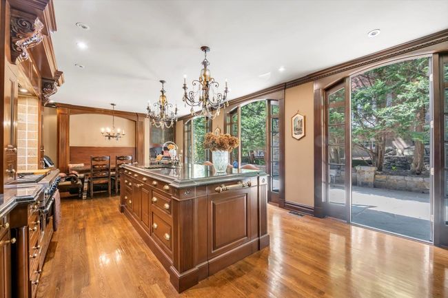 Kitchen w/designer French doors opening to patio great for entertaining! | Image 8