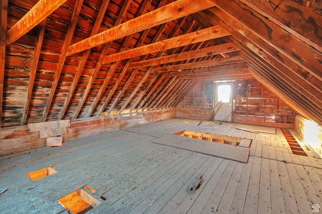 View of unfinished attic | Image 19