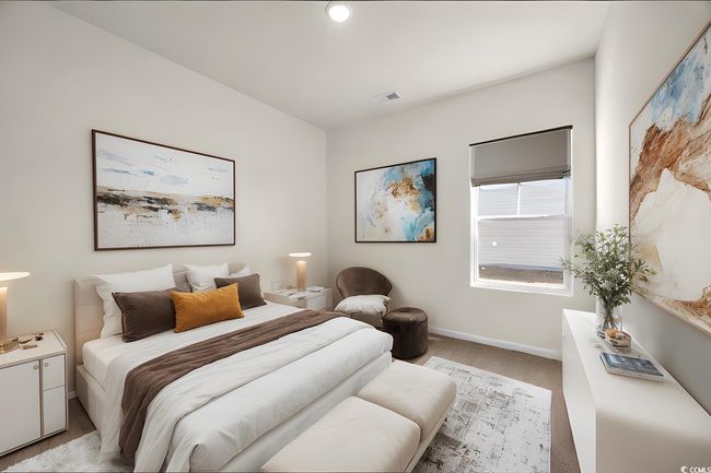 Bedroom with light colored carpet, baseboards, and visible vents | Image 7