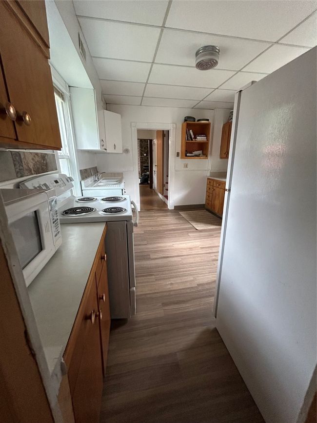 View of Kitchen From Bathroom Door | Image 27