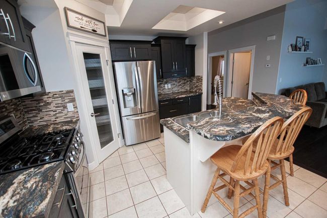 11806 Copperwood Road, Home with 4 bedrooms, 3 bathrooms and 4 parking in Grande Prairie AB | Image 6