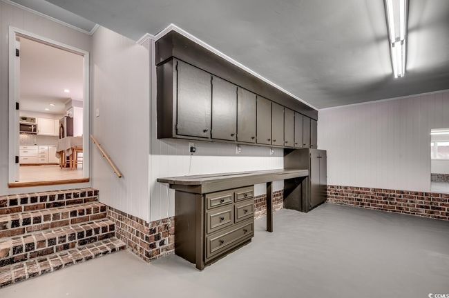 Below grade area with ornamental molding | Image 29