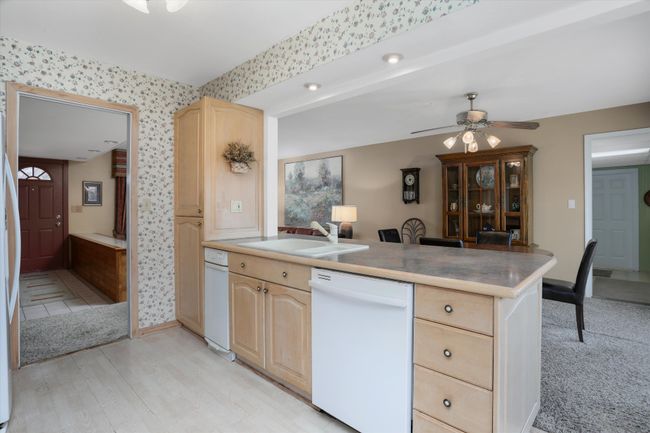 Kitchen is open to dining room | Image 11