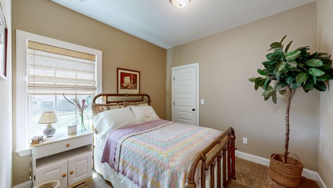 The third bedroom is pictured here with another large window and walk-in closet. | Image 25