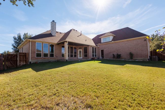 Back of property featuring a lawn | Image 33