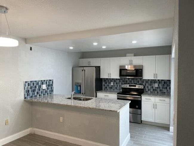6905 - 6905 69 Th Way, Condo with 2 bedrooms, 3 bathrooms and null parking in West Palm Beach FL | Image 10