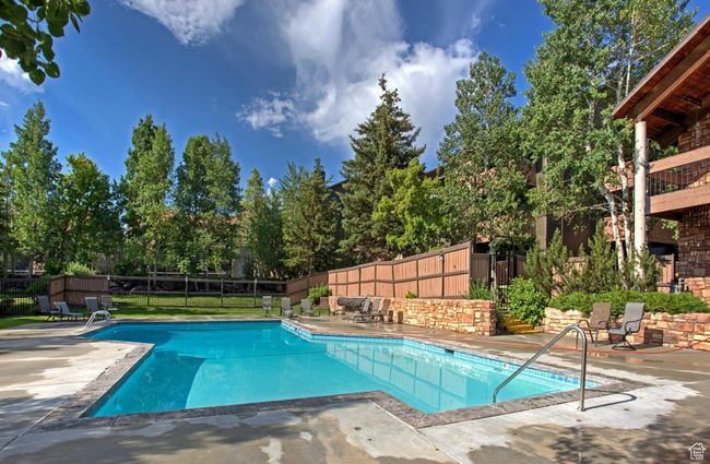 View of pool featuring a patio area | Image 30
