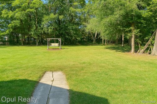 1489 Wren St, Wixom, MI, 48393-1562 | Card Image