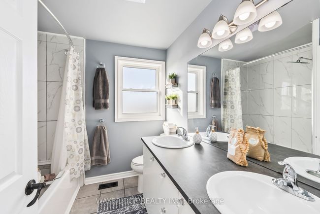 24 Mckeown Cres, House attached with 3 bedrooms, 2 bathrooms and 4 parking in Amherstview ON | Image 33