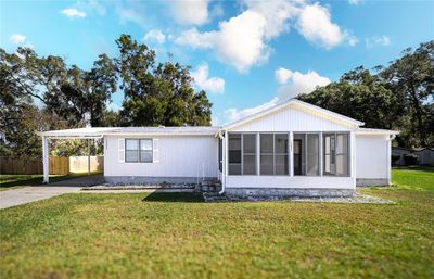 13985 Se 66 Th Court, House other with 2 bedrooms, 2 bathrooms and null parking in SUMMERFIELD FL | Image 1