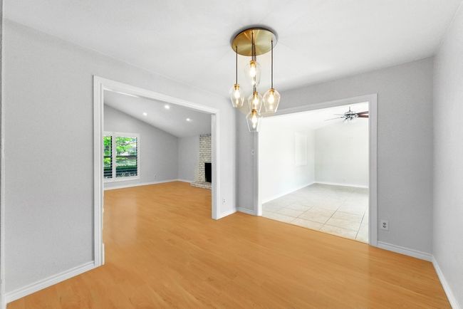 Dining room with view to Sun room | Image 11