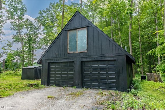 Garage featuring a detached garage | Image 4