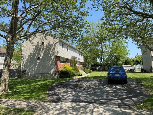 87-85-87 Washington St, East Islip, NY, 11730-1822 | Card Image