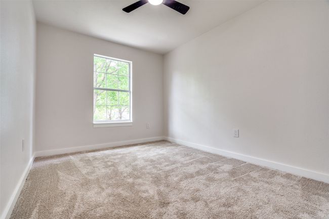 Unfurnished room with a ceiling fan and carpet floors | Image 24