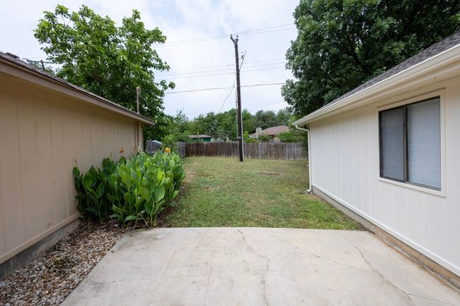 View of yard with a​​‌​​​​‌​​‌‌​‌‌​​​‌‌​​‌‌​‌​​​​​‌ patio | Image 34
