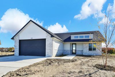 View of front of home with a garage | Image 1