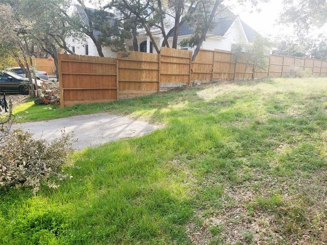 View of yard featuring fence | Image 4