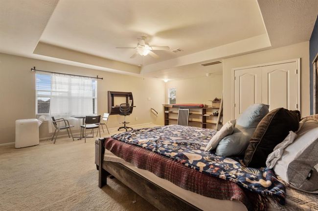The upstairs game room has large windows with plenty of natural light. | Image 18