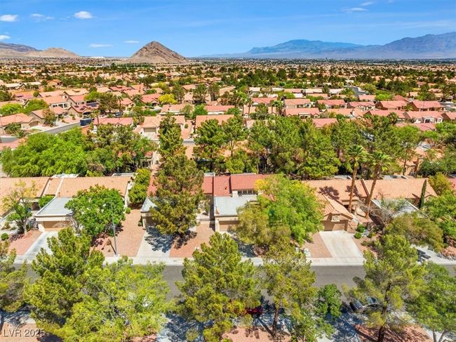 Experience premier golf & resort-style living in the renowned Sun City Summerlin community, offering four exceptional recreation centers, three championship golf courses, indoor and outdoor pools, a state-of-the-art theater, fully equipped fitness centers, pickleball and tennis courts, a softball field, and an active social calendar designed for vibrant living. Ideally located just minutes from Downtown Summerlin’s upscale shopping and dining, the iconic Las Vegas Strip | Image 35