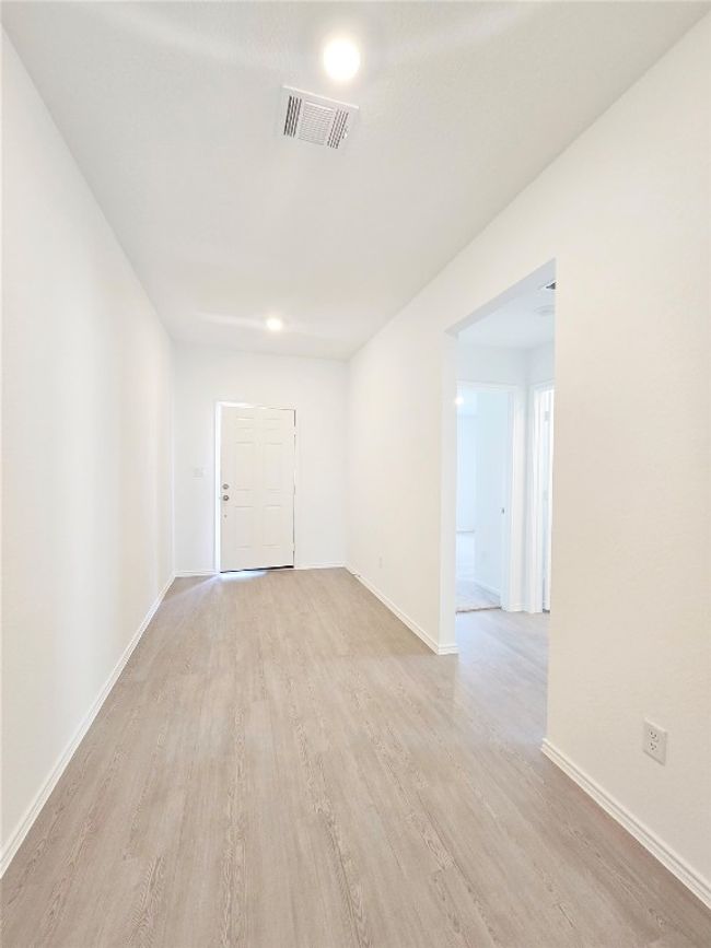 Spare room with light wood-style flooring and baseboards | Image 30