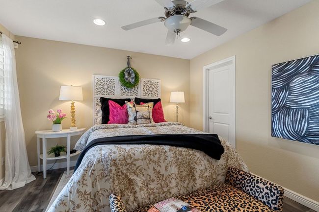 1st Floor Bedroom #3 with ceiling fan, recessed lighting, wood finished floors, and baseboards | Image 30