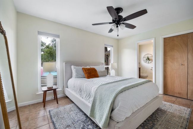 Primary bedroom with his and hers closets | Image 23