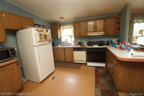 51105 Arkona Rd, Sumpter Township, MI, 48111-8819 | Card Image