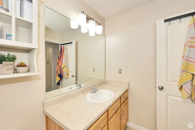 Bathroom with baseboards and vanity | Image 12