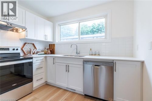 63 Woodman Dr N, Hamilton, ON, L8H2M6 | Card Image