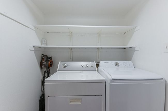 Laundry room featuring independent washer and dryer and laundry area | Image 21
