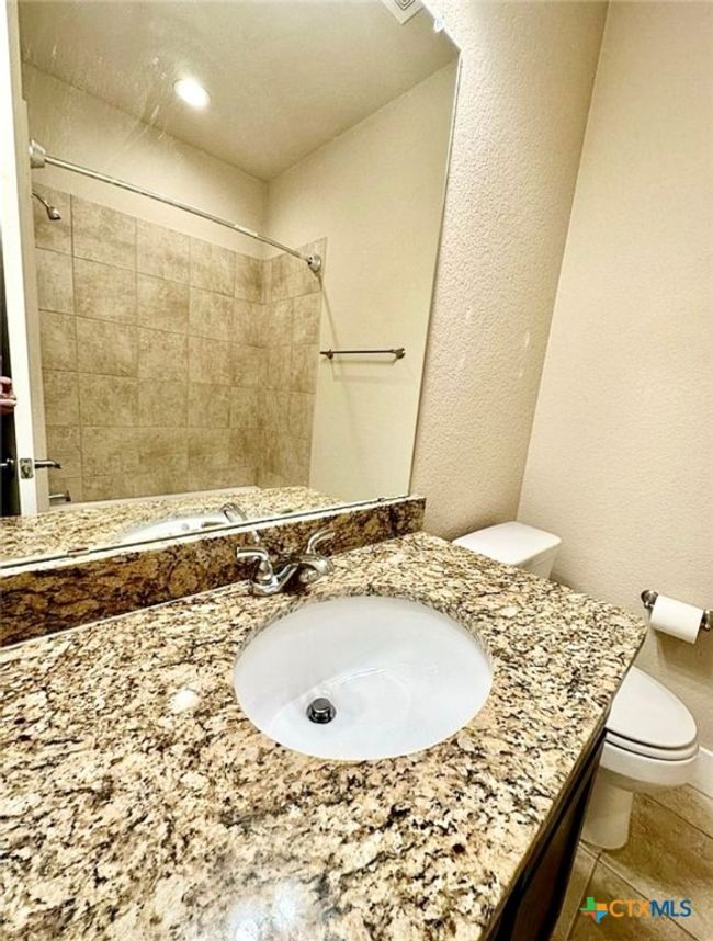granite vanity - upstairs bathroom | Image 20
