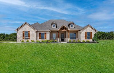 Craftsman inspired home featuring a front lawn | Image 1