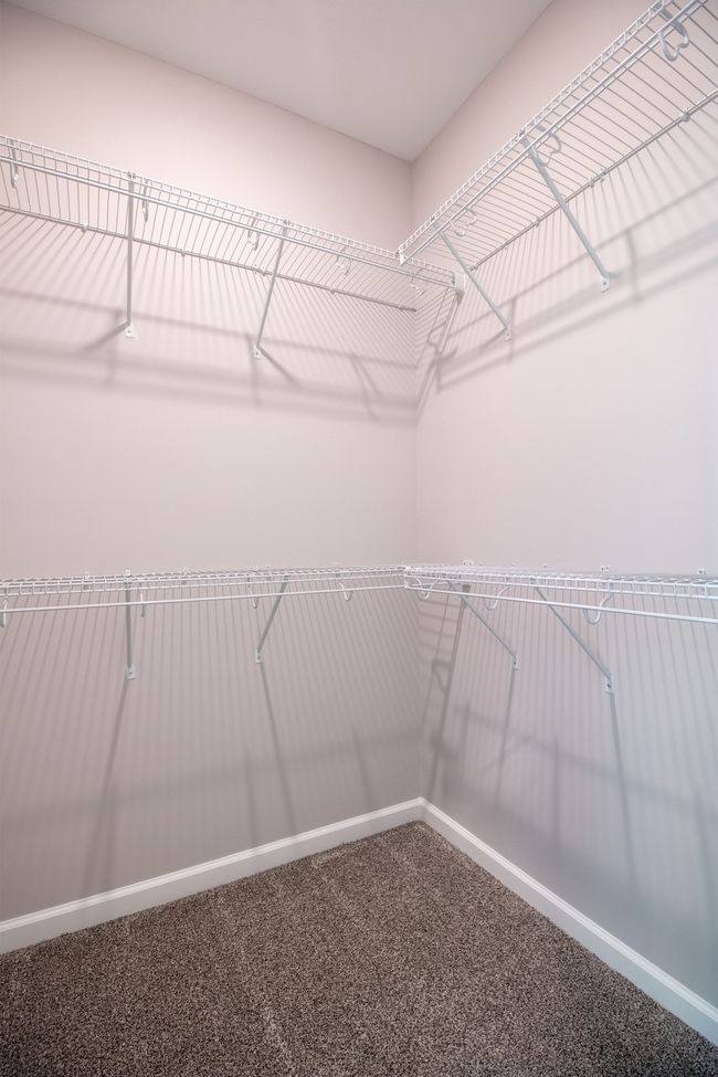 EXAMPLE>>>One of the Walk-in Closets! Tons of Shelving!! (Primary Bedroom) | Image 14