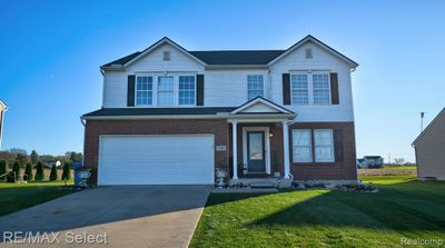 7391 Deer Creek Drive, Home with 4 bedrooms, 2 bathrooms and null parking in Clayton Twp MI | Image 3