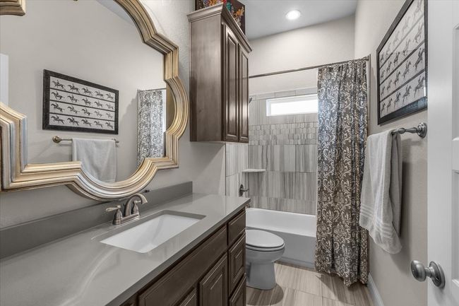 Full bath with decorative mirror | Image 22