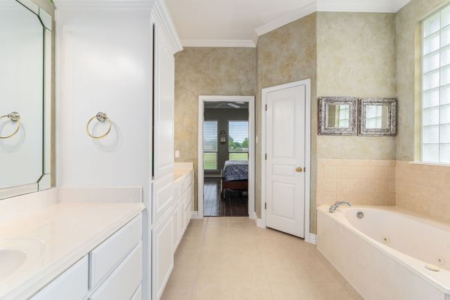 View from Primary bath towards the primary bedroom | Image 19