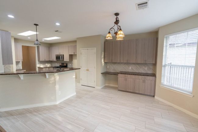 10920 Quarry Oaks Trl, House other with 5 bedrooms, 4 bathrooms and 2 parking in Austin TX | Image 9