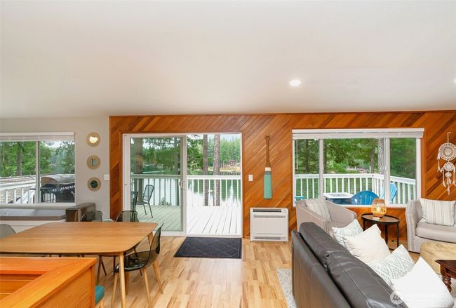Walls of windows and oversized slider to the deck | Image 14