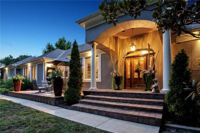 Entrance to property with a patio area | Image 1