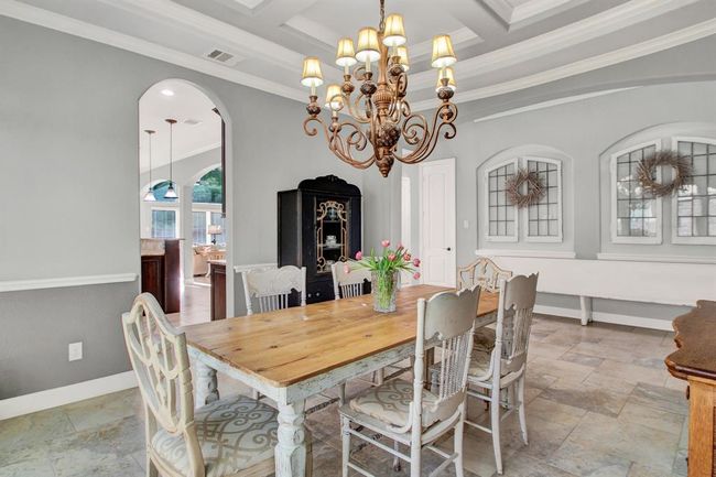 Formal dining room is the perfect place for a special meal, or to entertain a crowd! Sophisticated yet warm and inviting. Chair rail detail and another spectacular ceiling! | Image 8