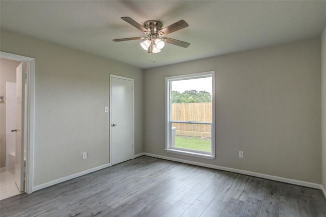 Another view of the bedroom. | Image 14