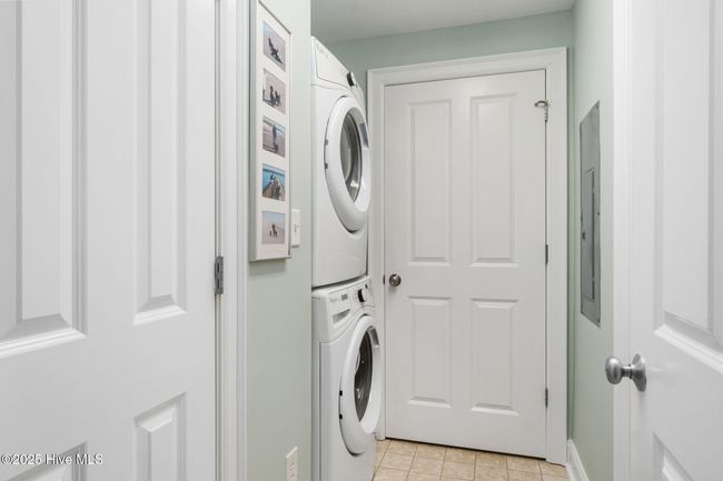 Additional storage closet in laundry area | Image 21