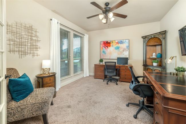 Office with carpet floors, a ceiling fan, and baseboards | Image 19
