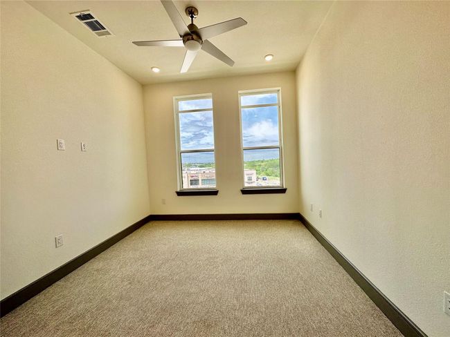 Carpeted empty room with ceiling fan | Image 7